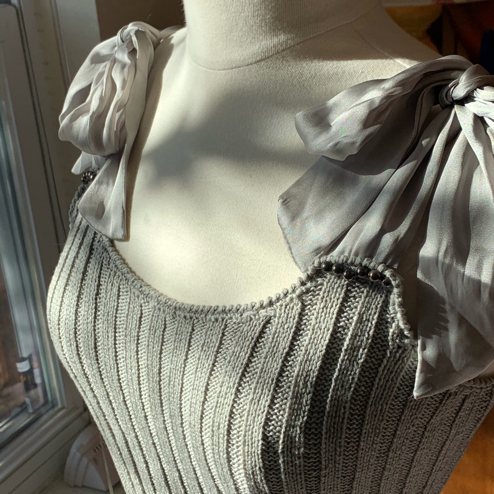 Body Con sleeveless sweater dress.